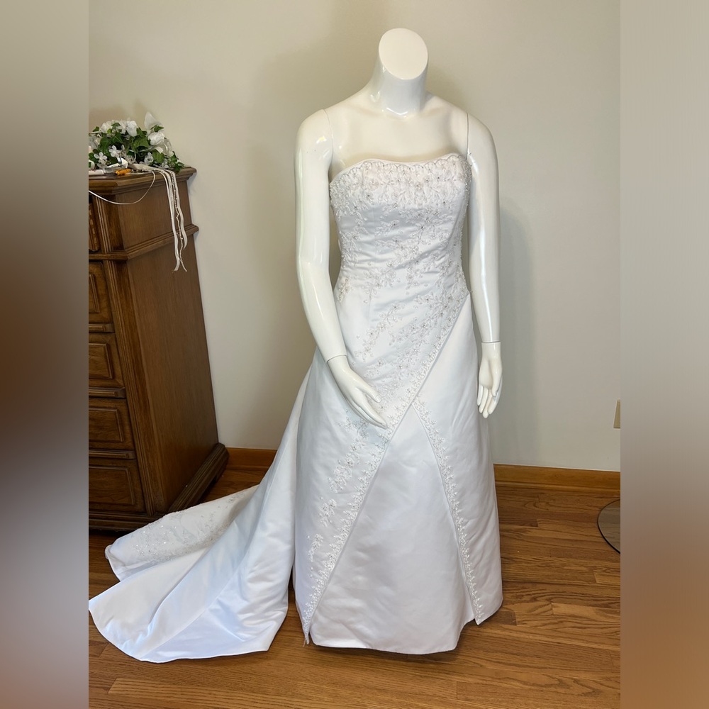 White David’s Bridal style V8591 beaded A-line with train.